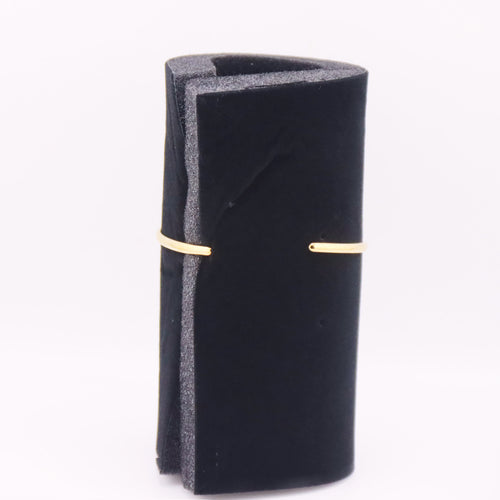 Bracciale Donna dorato design fluido a forma di onda o "S"